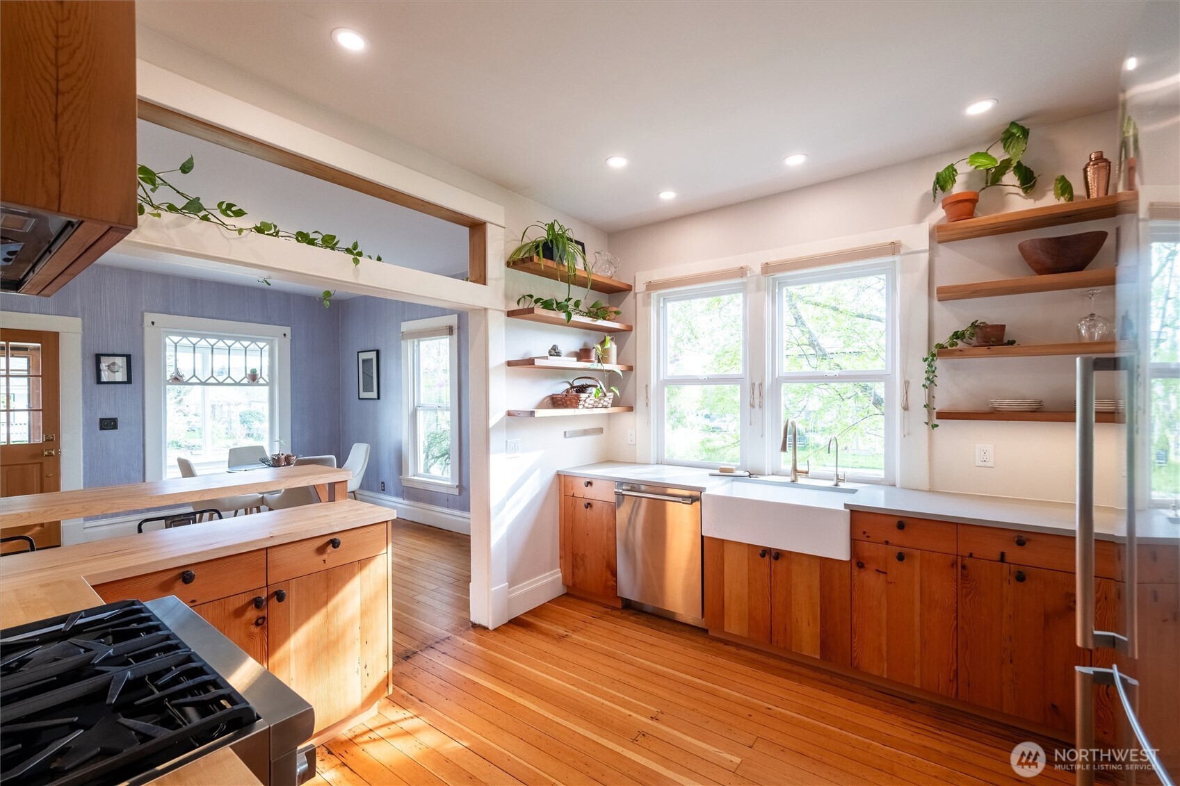 2301 I Street Bellingham, WA 98225 - Photo 6 of 28 a large kitchen with stainless steel appliances granite countertop a stove and a large window