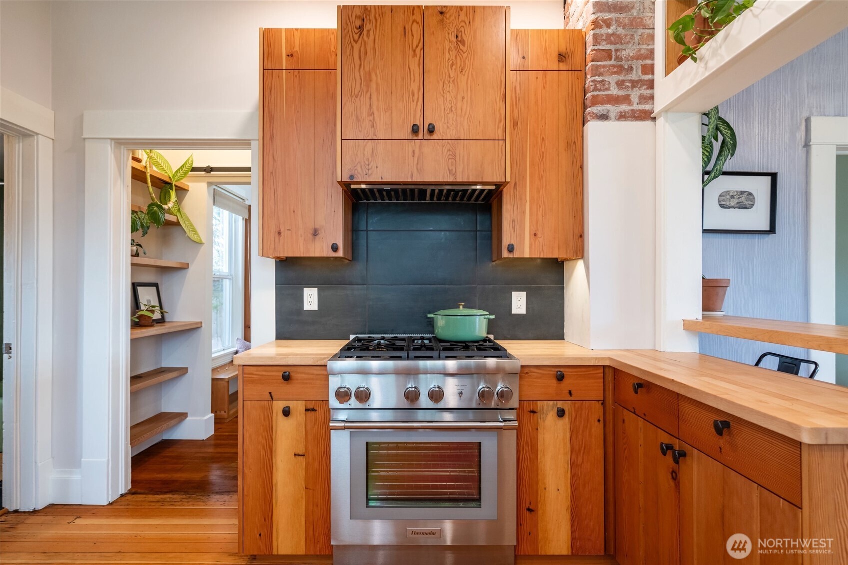 2301 I Street Bellingham, WA 98225 - Photo 9 of 28 a kitchen with stainless steel appliances granite countertop a stove and a microwave