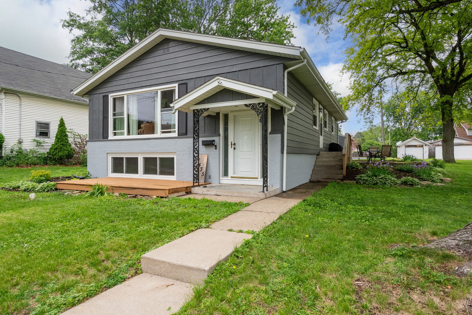 1435 26th Avenue Moline, IL 61265 - Photo 2 of 38 a view of house with a yard