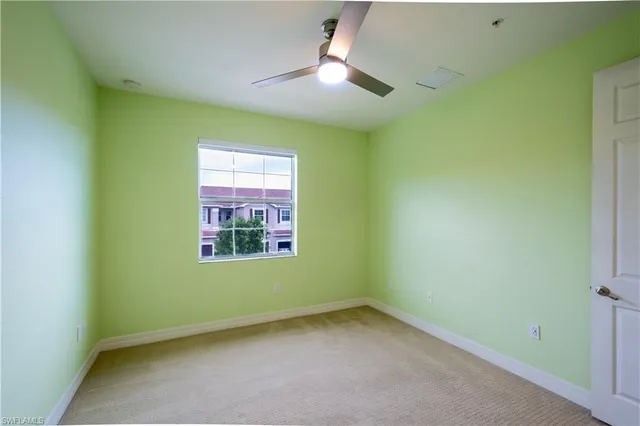 an empty room with a bathroom