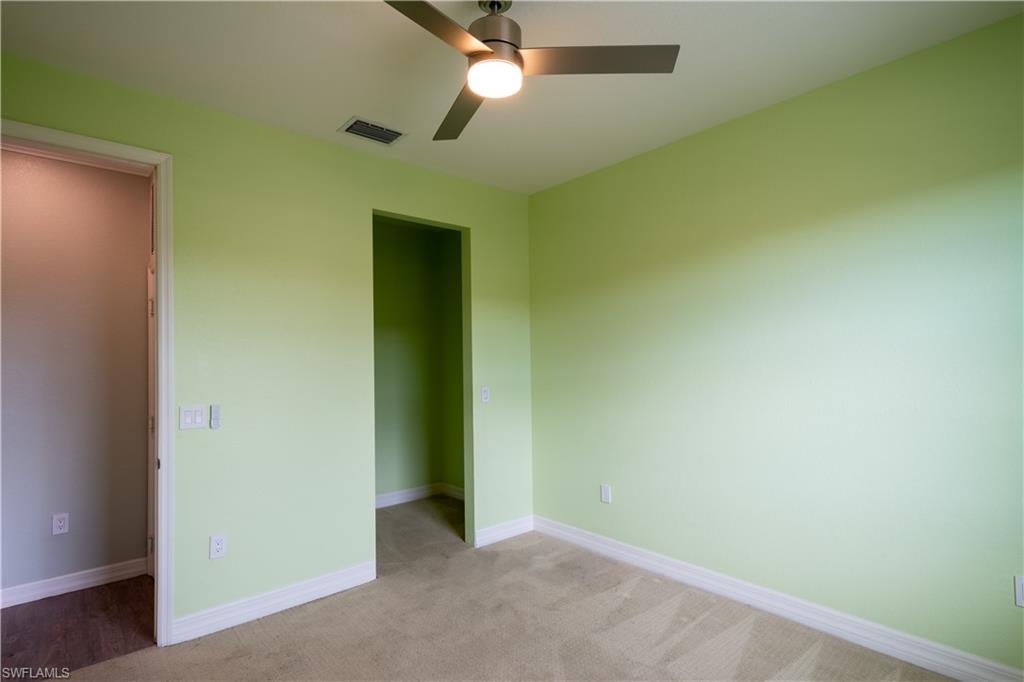 6533 Monterey Point, Unit 204 Naples, FL 34105 - Photo 21 of 41 an empty room with a bathroom