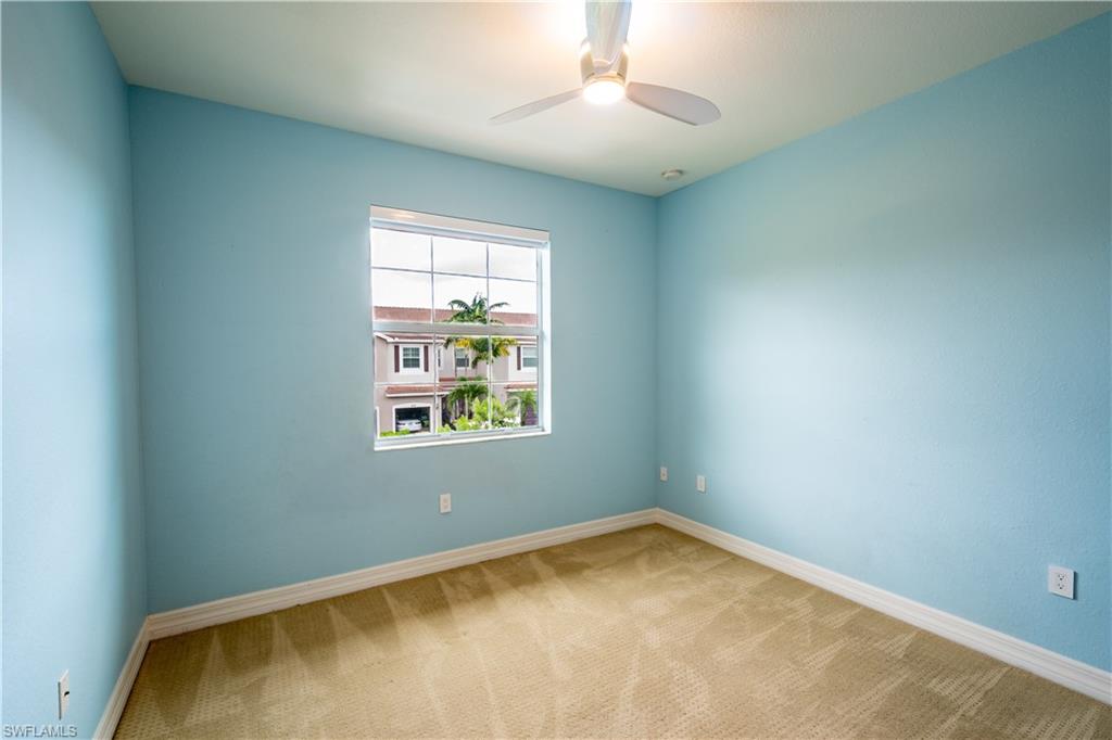 6533 Monterey Point, Unit 204 Naples, FL 34105 - Photo 23 of 41 an empty room with windows