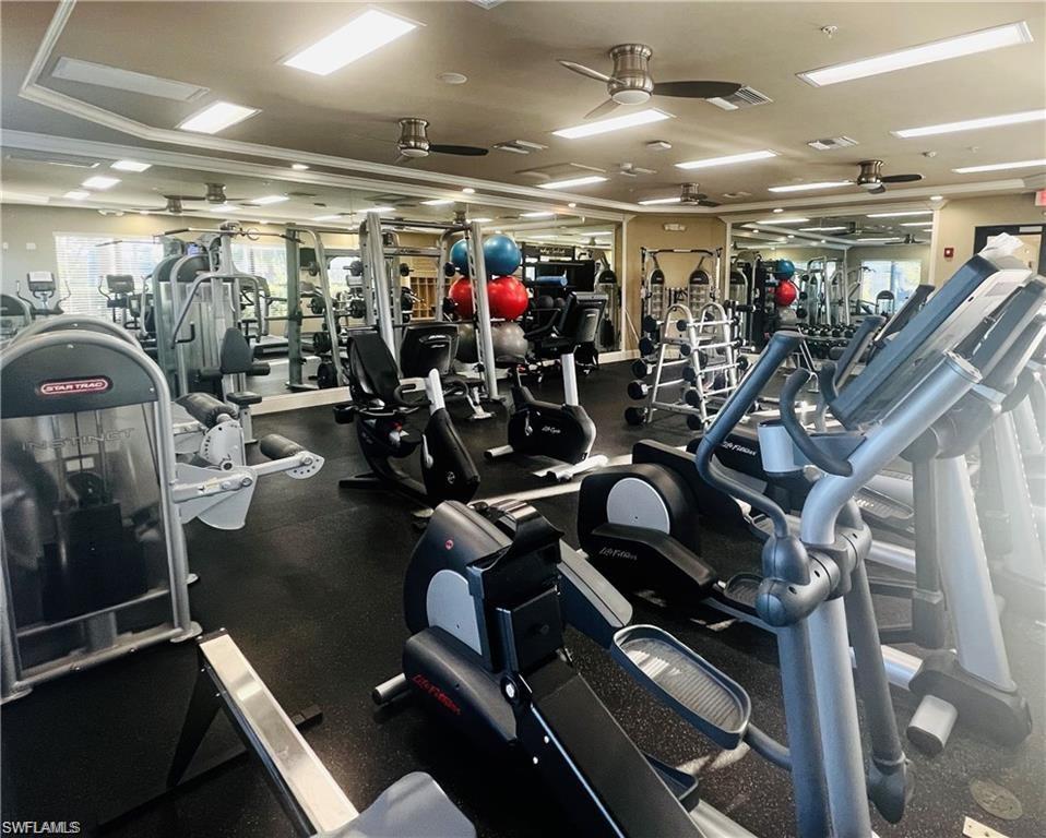 6533 Monterey Point, Unit 204 Naples, FL 34105 - Photo 37 of 41 a view of a room with gym equipment