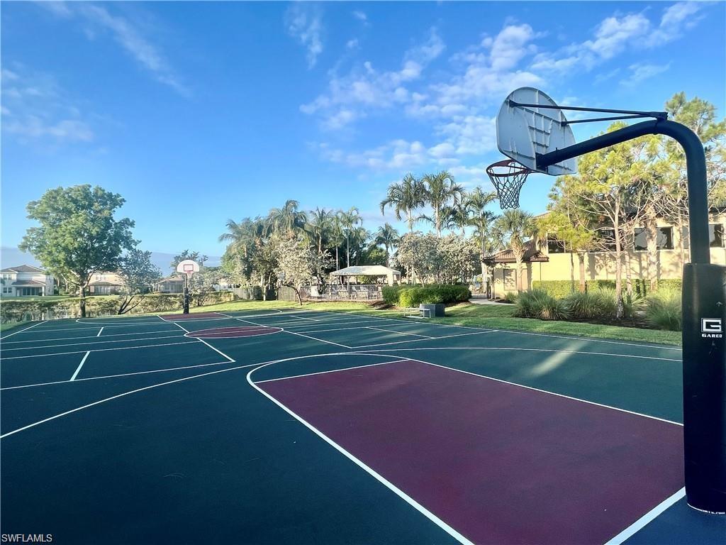 6533 Monterey Point, Unit 204 Naples, FL 34105 - Photo 40 of 41 a view of a tennis court