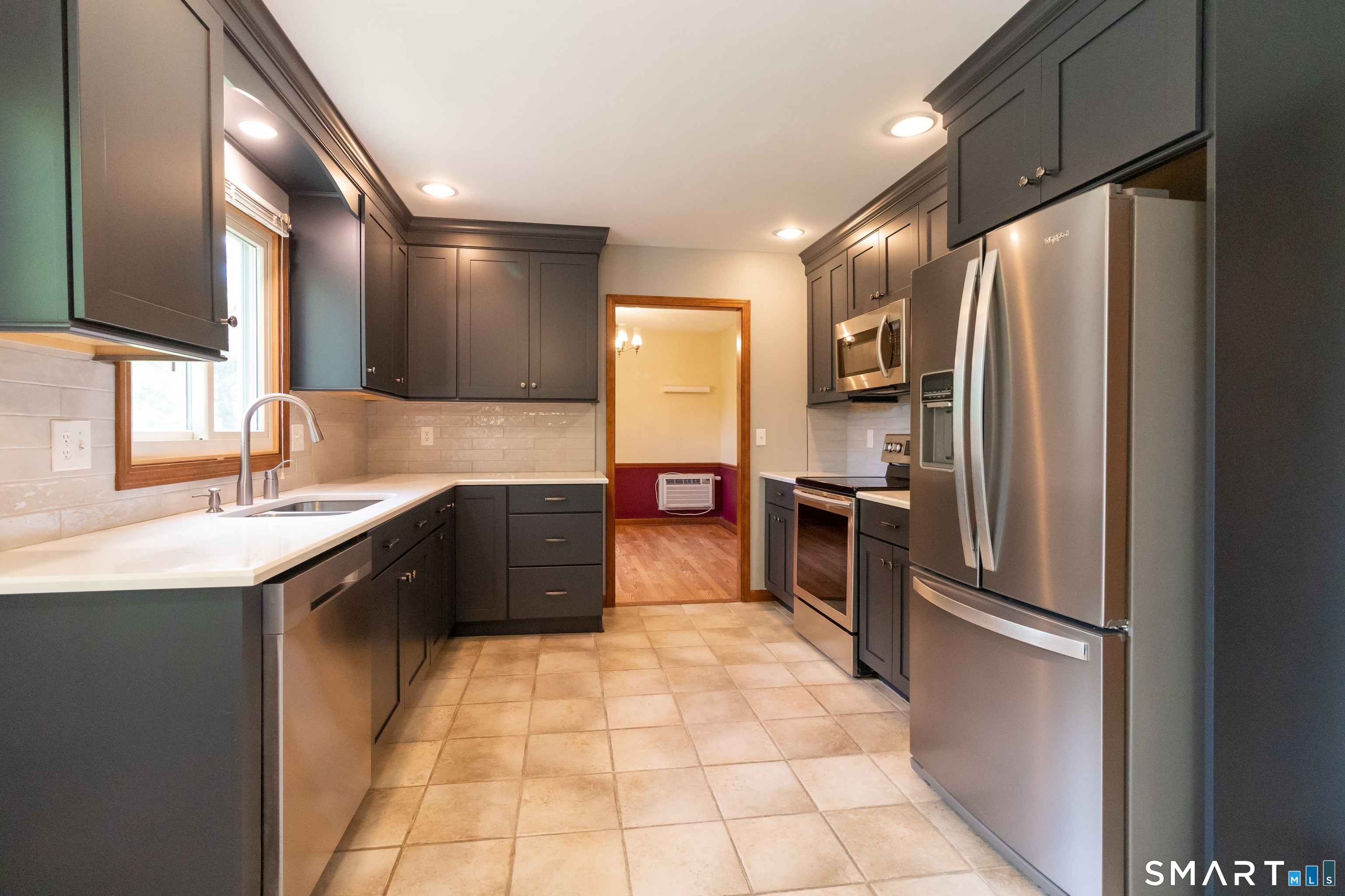 15 Kennedy Road Windsor, CT 06095 - Photo 6 of 40 Newly renovated Quartz kitchen and stainless appliances