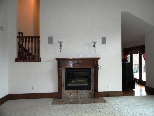 71587 Orchards End Romeo, MI 48065 - Photo 5 of 22 Living Room FP Wall