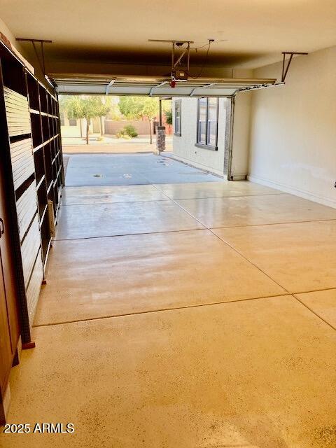 3914 East Constance Way Phoenix, AZ 85042 - Photo 21 of 81 a view of walk in closet with clothes and shoes
