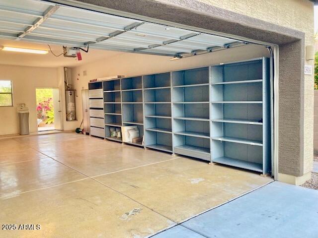 3914 East Constance Way Phoenix, AZ 85042 - Photo 23 of 81 a view of an empty room with a fireplace and a window