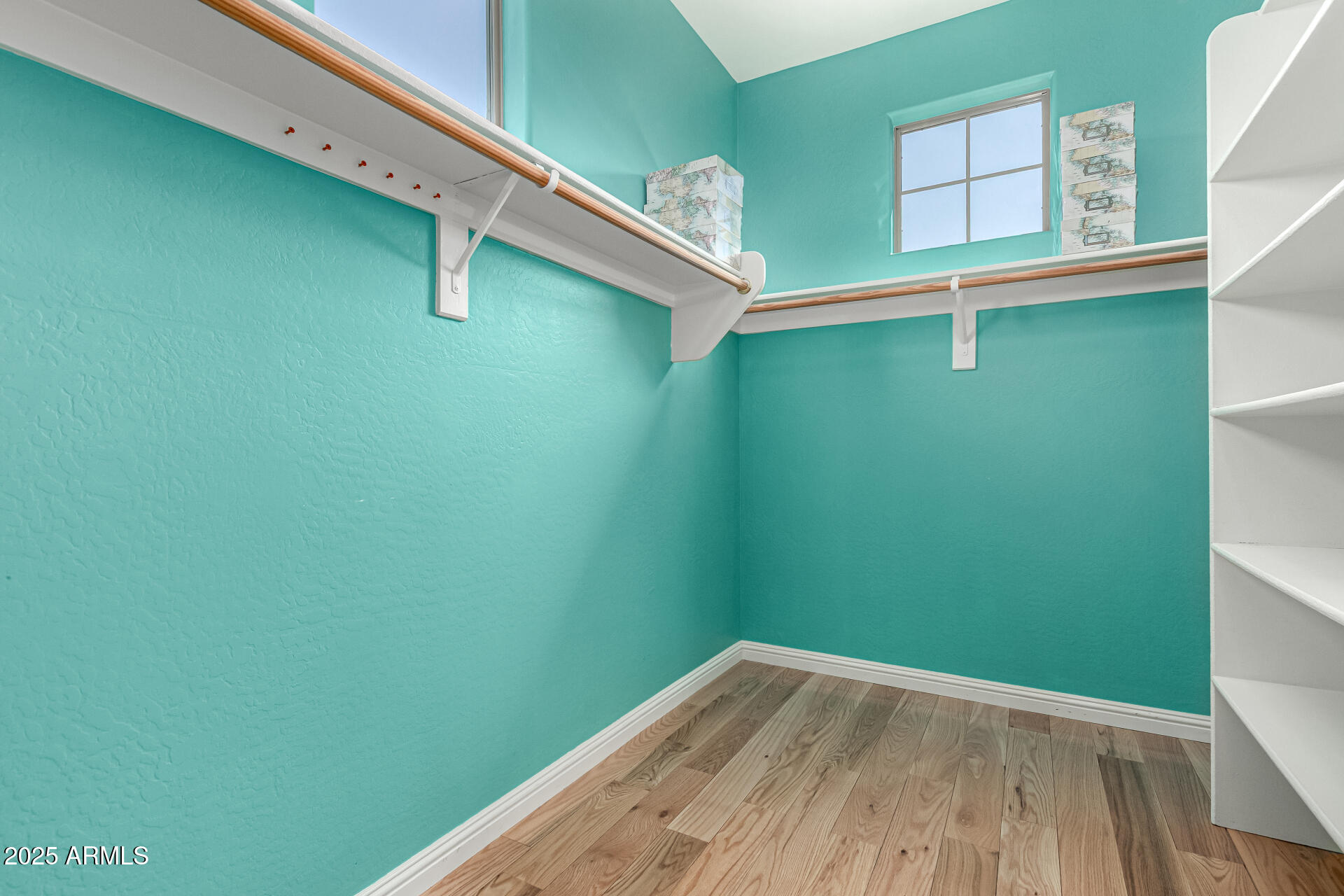 3914 East Constance Way Phoenix, AZ 85042 - Photo 43 of 81 a view of a room with racks on the wall