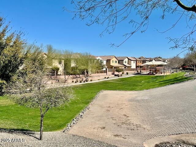 3914 East Constance Way Phoenix, AZ 85042 - Photo 66 of 81 a view of a street with a building in the background