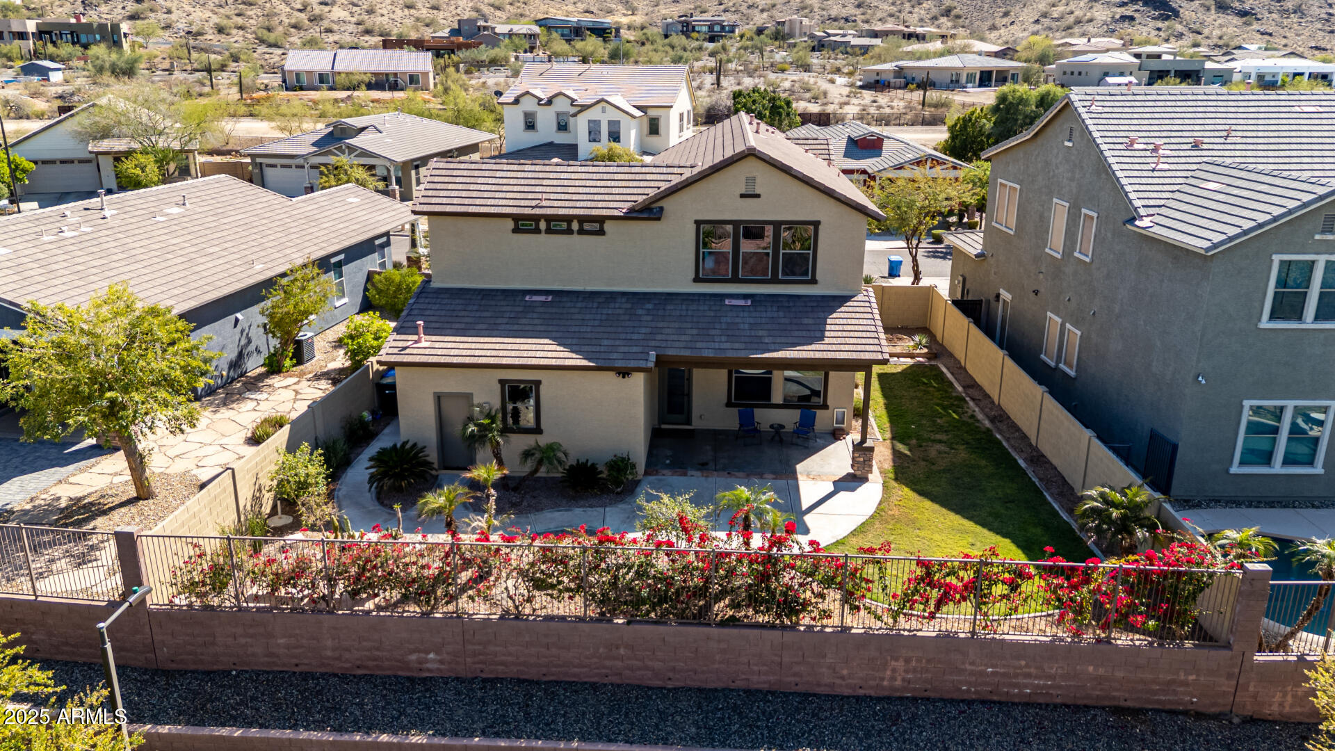 3914 East Constance Way Phoenix, AZ 85042 - Photo 7 of 81 an aerial view of a house with a yard basket ball court and outdoor seating