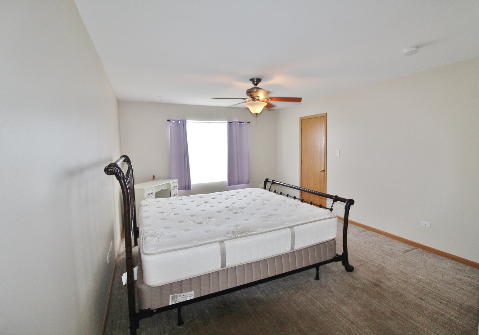 2005 Mountain Road Morris, IL 60450 - Photo 15 of 30 a bedroom with a bed and a chandelier