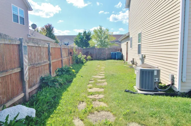 a view of a back yard of the house