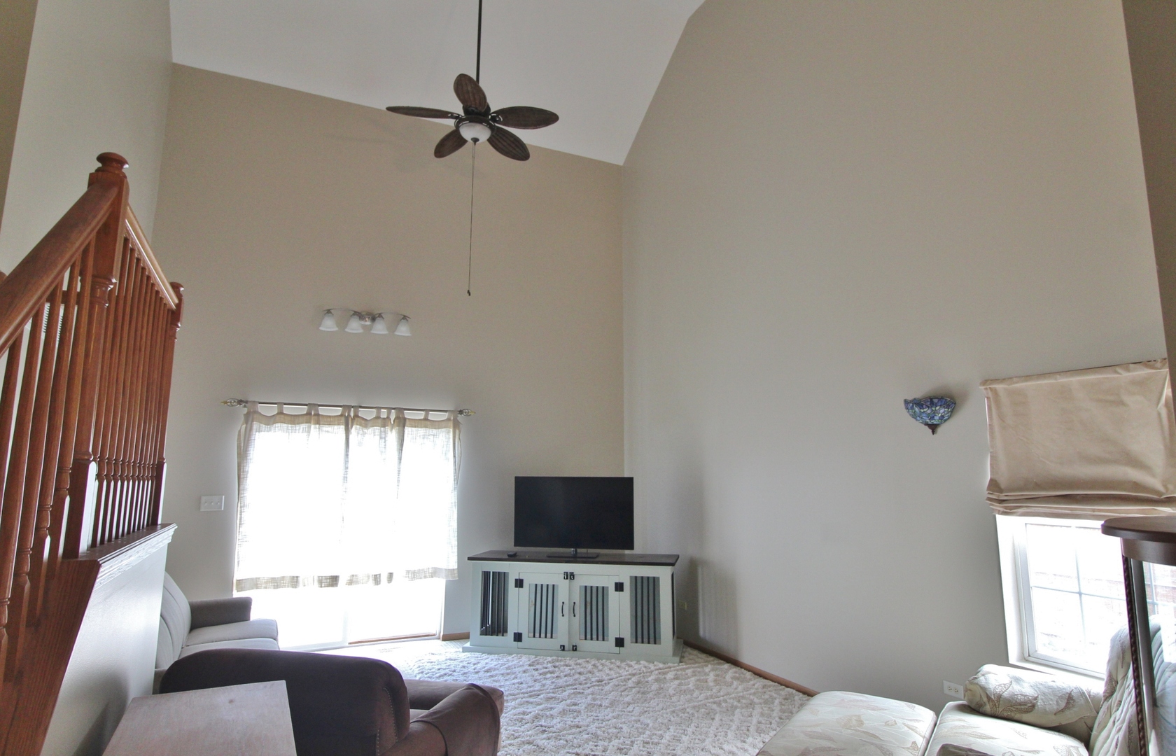 2005 Mountain Road Morris, IL 60450 - Photo 9 of 30 a living room with furniture and a flat screen tv