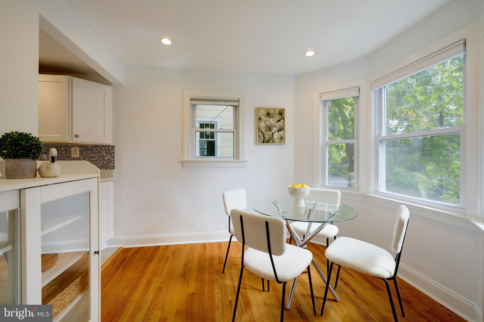 704 Maplewood Avenue Takoma Park, MD 20912 - Photo 20 of 54 a dining room with furniture and window