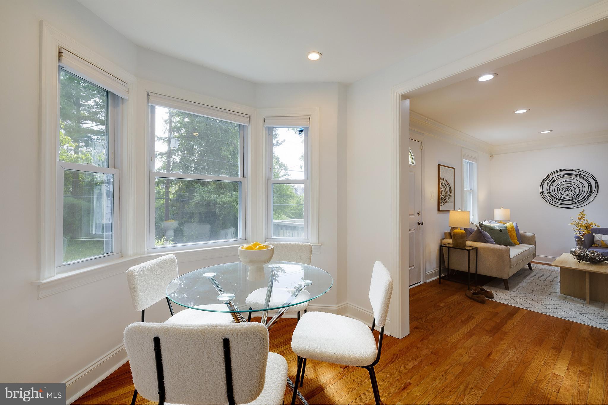 704 Maplewood Avenue Takoma Park, MD 20912 - Photo 21 of 54 a living room with furniture and a window