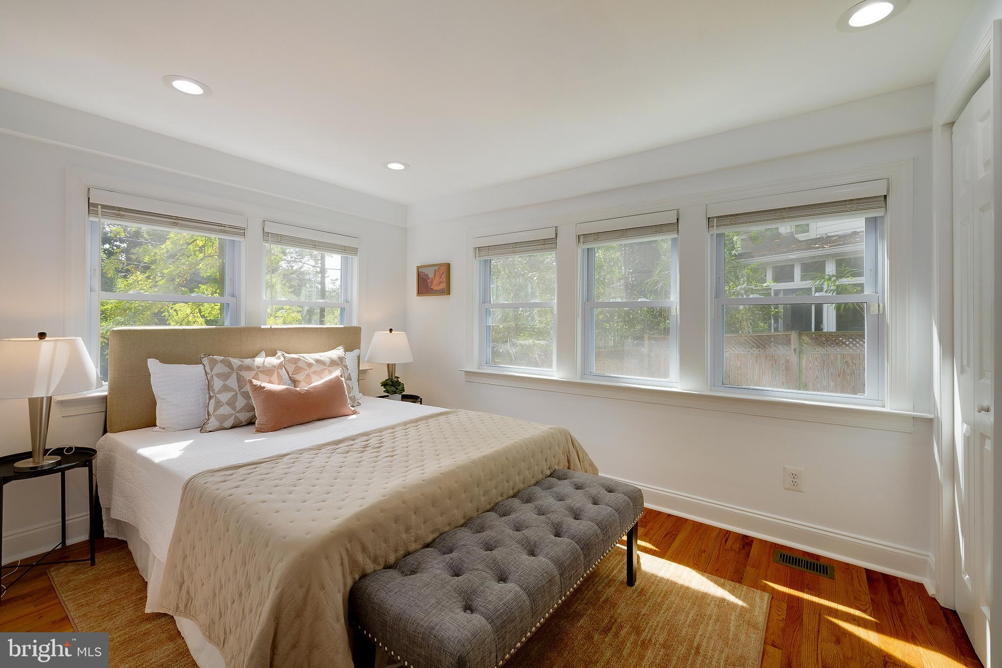 704 Maplewood Avenue Takoma Park, MD 20912 - Photo 23 of 54 a bedroom with a bed and a large window
