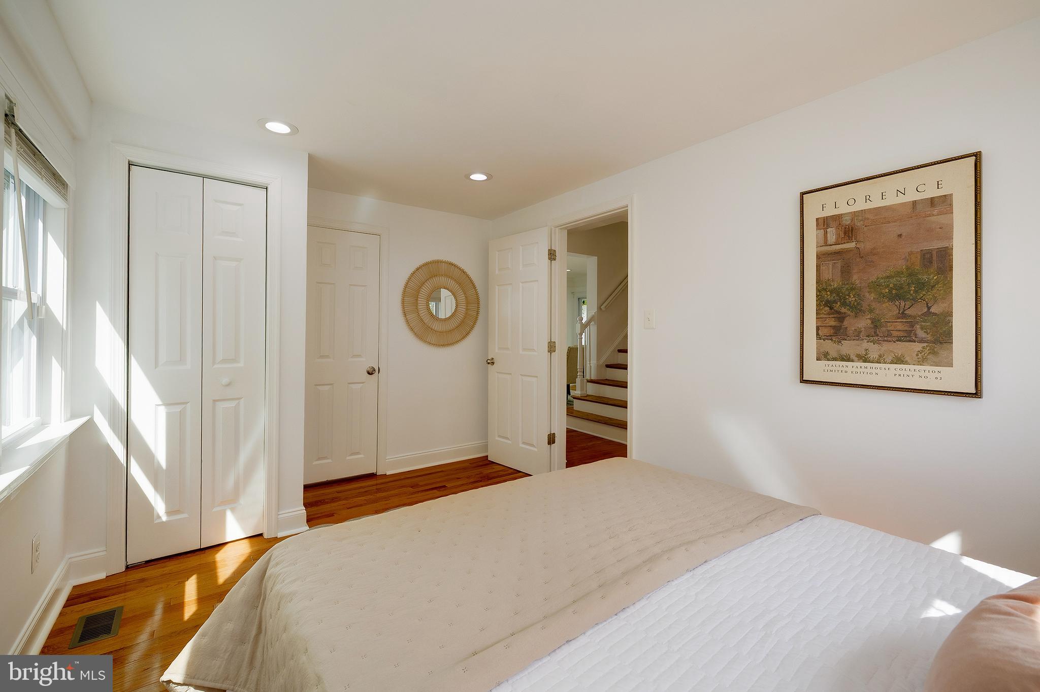 704 Maplewood Avenue Takoma Park, MD 20912 - Photo 25 of 54 a bedroom with a bed and a window