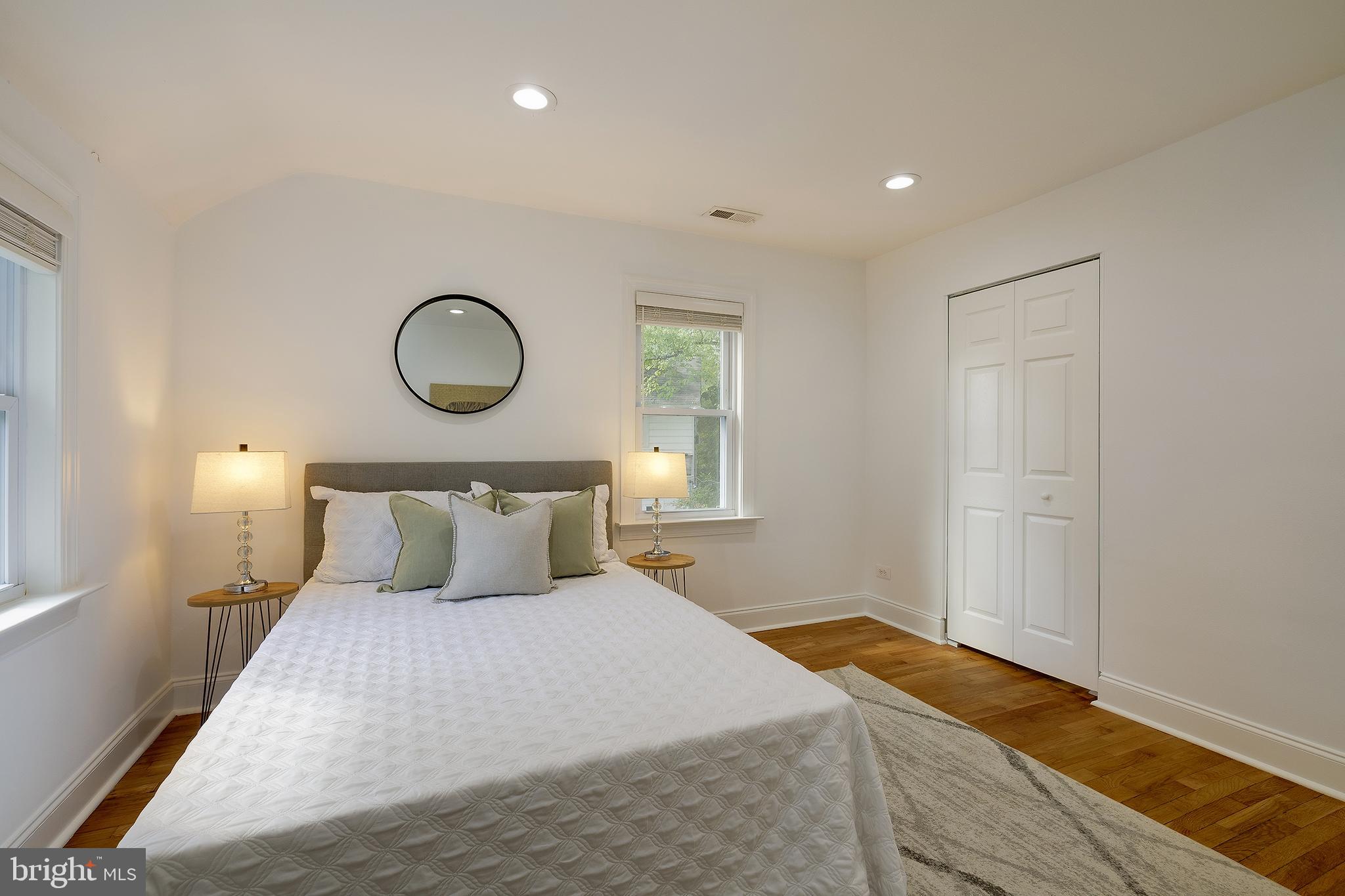 704 Maplewood Avenue Takoma Park, MD 20912 - Photo 31 of 54 a bedroom with a bed and window