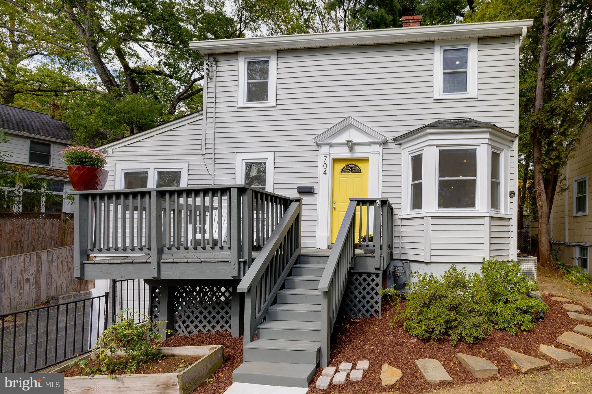 704 Maplewood Avenue Takoma Park, MD 20912 - Photo 4 of 54 a view of a house with wooden deck and furniture