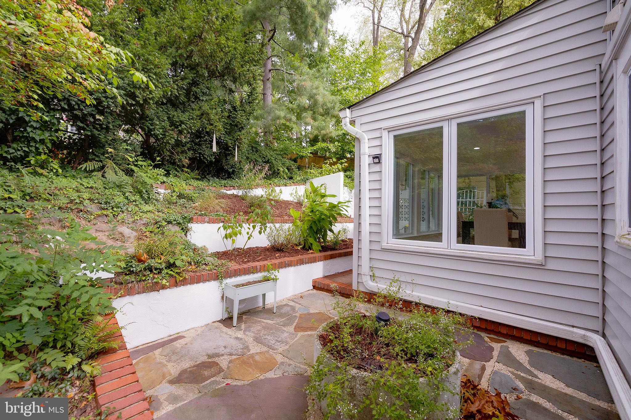 704 Maplewood Avenue Takoma Park, MD 20912 - Photo 46 of 54 a front view of a house with a yard