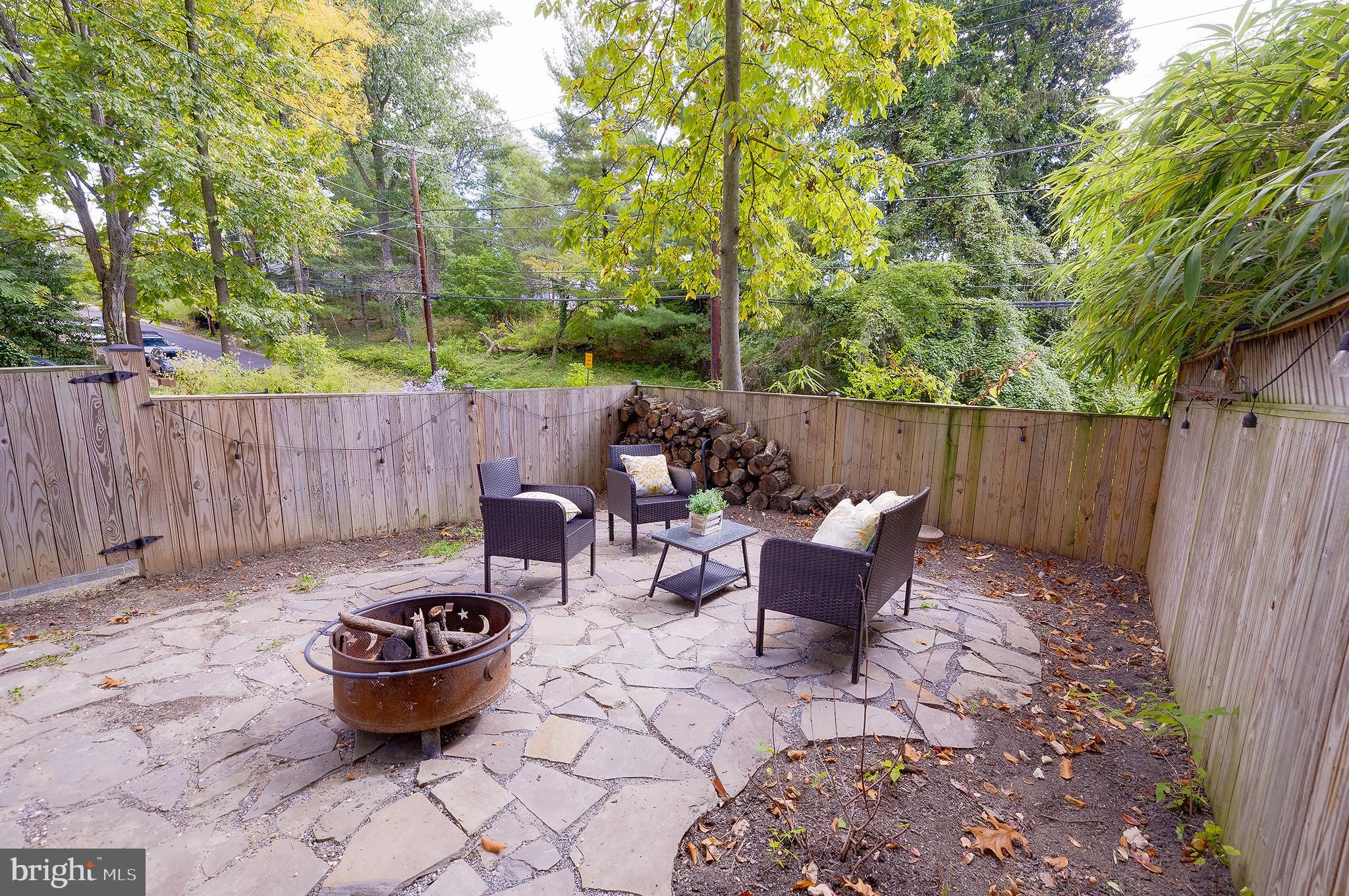 704 Maplewood Avenue Takoma Park, MD 20912 - Photo 48 of 54 a view of a backyard with sitting area and garden