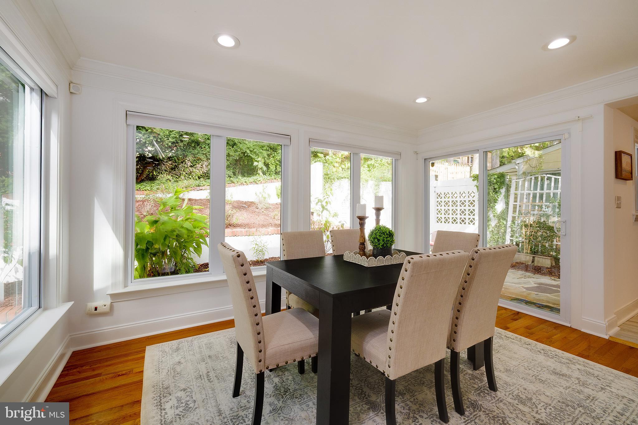 704 Maplewood Avenue Takoma Park, MD 20912 - Photo 10 of 54 a view of a dining room with furniture window and outside view