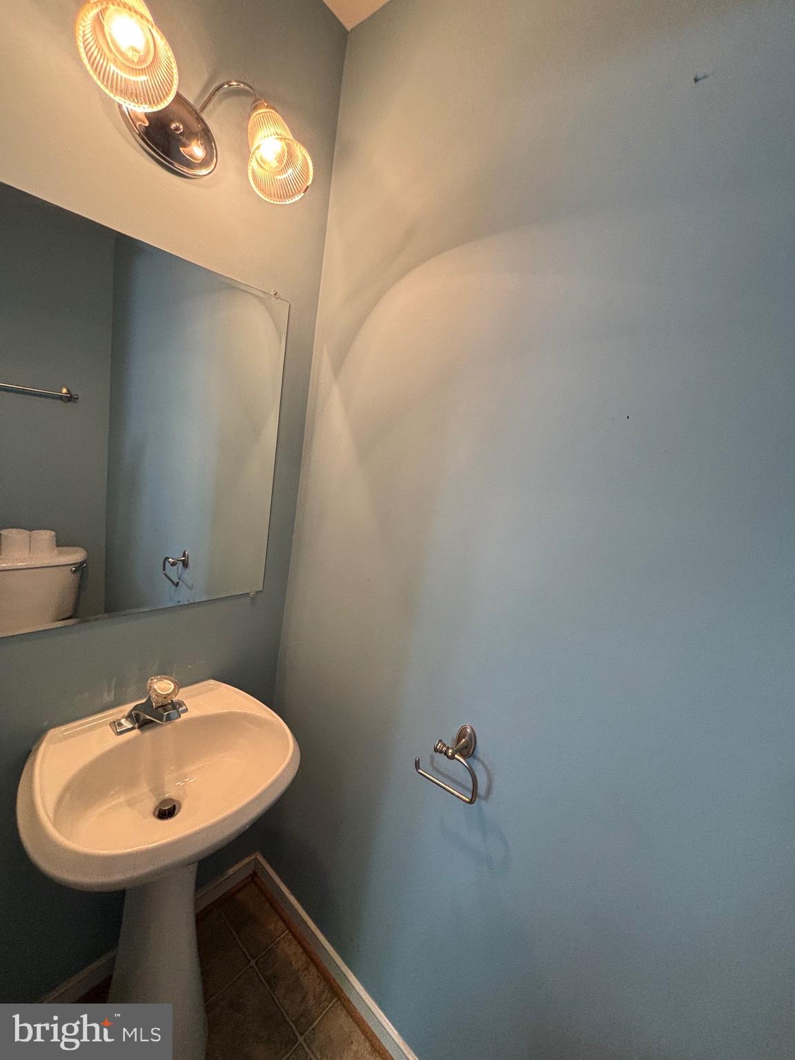 200 Torbert Loop Stafford, VA 22554 - Photo 15 of 28 a bathroom with a sink and a mirror