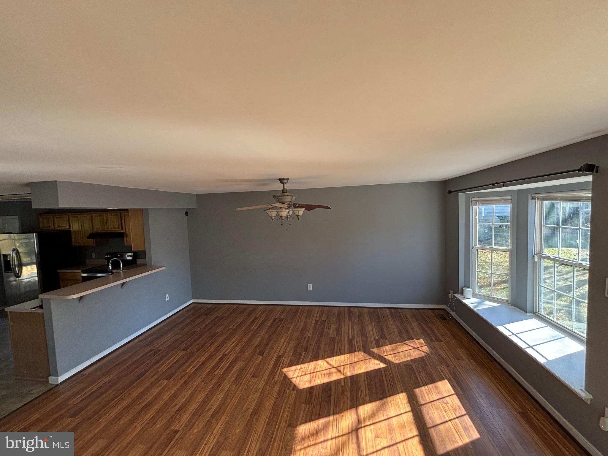 200 Torbert Loop Stafford, VA 22554 - Photo 9 of 28 a view of a kitchen with wooden floor and electronic appliances