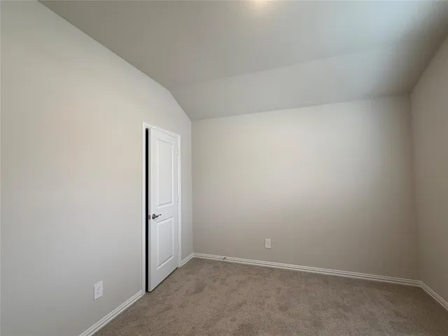 a bathroom with a sink a mirror and a tub