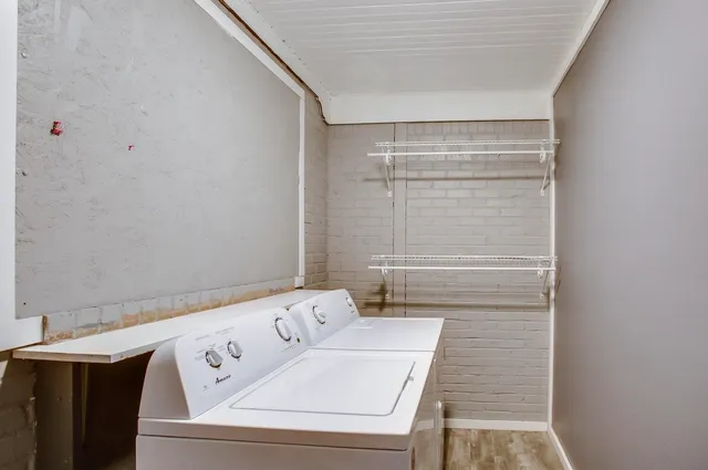 a utility room with dryer and washer