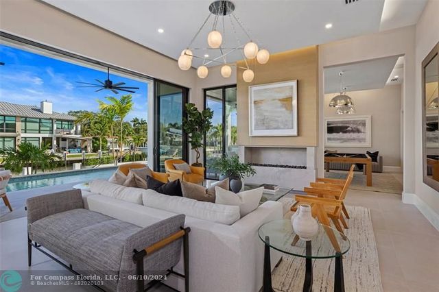 a view of swimming pool with seating area