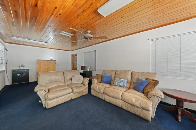 a living room with furniture and a couch