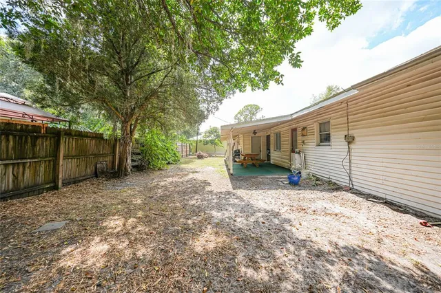 a house with swimming pool in front of it