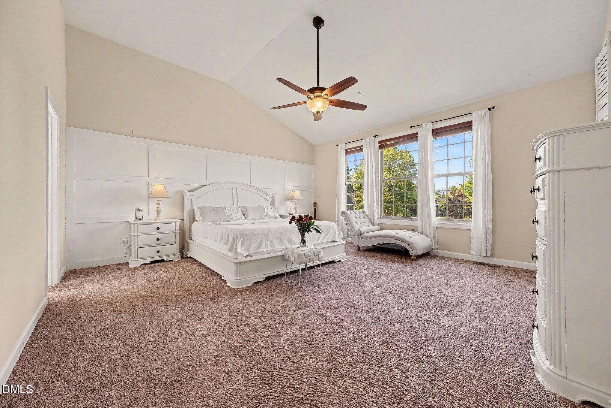4000 Banks Stone Drive Raleigh, NC 27603 - Photo 8 of 60 a spacious bedroom with a bed window and a table