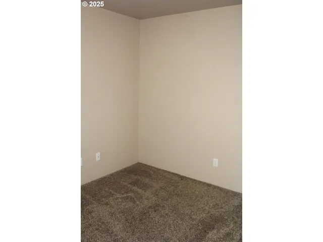 a picture of a room with a bench