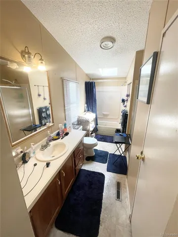a bathroom with a sink double vanity and a mirror