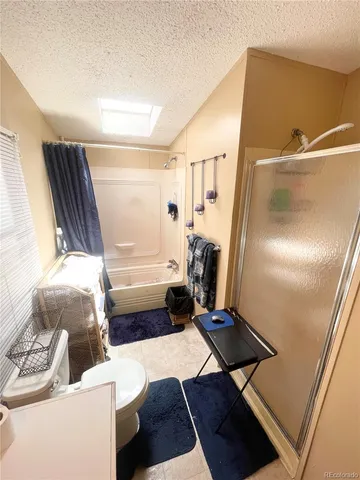 a living room with a couch and a table