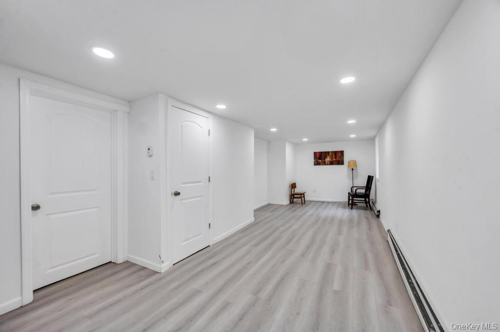 3 Adams Road Central Islip, NY 11722 - Photo 17 of 22 a view of empty room with wooden floor