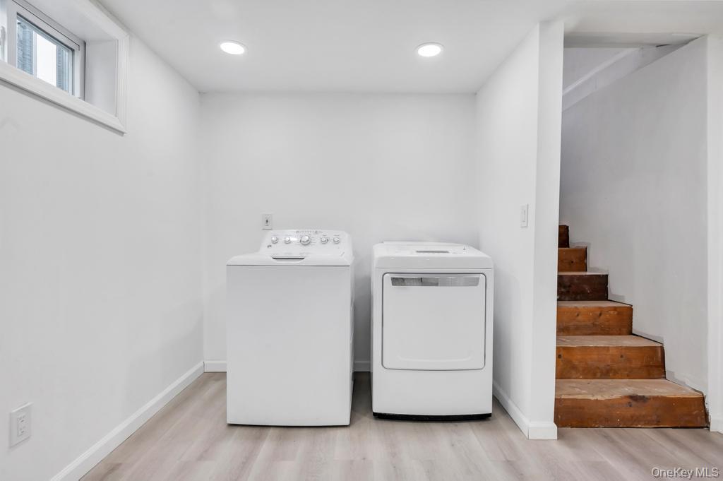 3 Adams Road Central Islip, NY 11722 - Photo 19 of 22 a utility room with dryer and washer