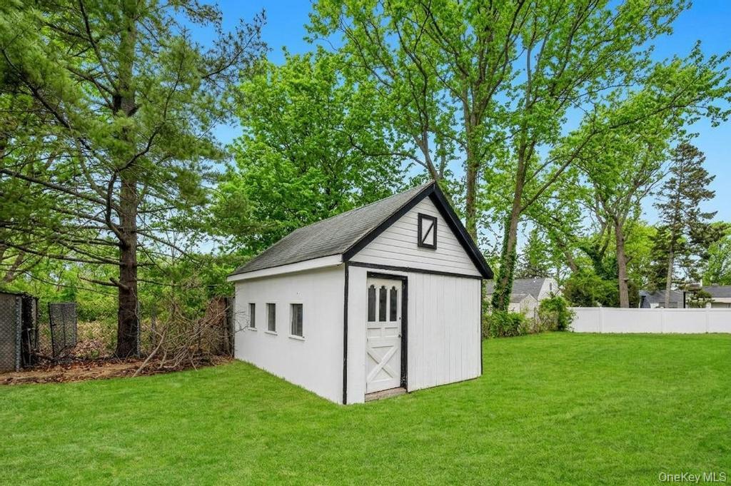 3 Adams Road Central Islip, NY 11722 - Photo 22 of 22 a view of a house with a yard