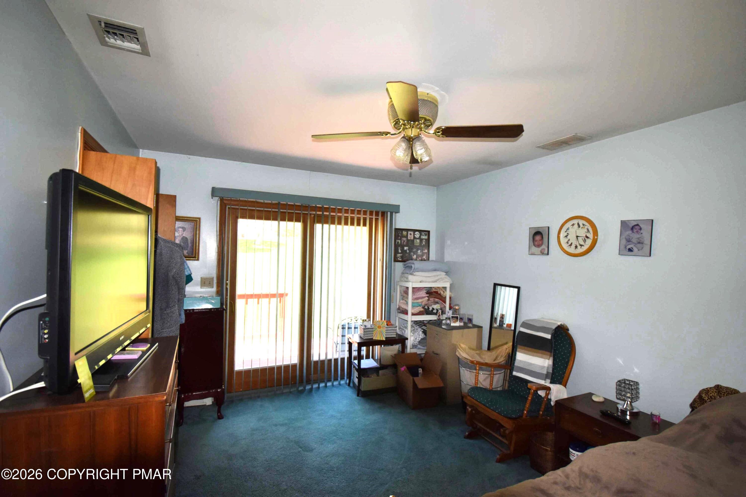 160 Quiet Valley Road Mount Bethel, PA 18343 - Photo 28 of 44 a living room with furniture and a flat screen tv