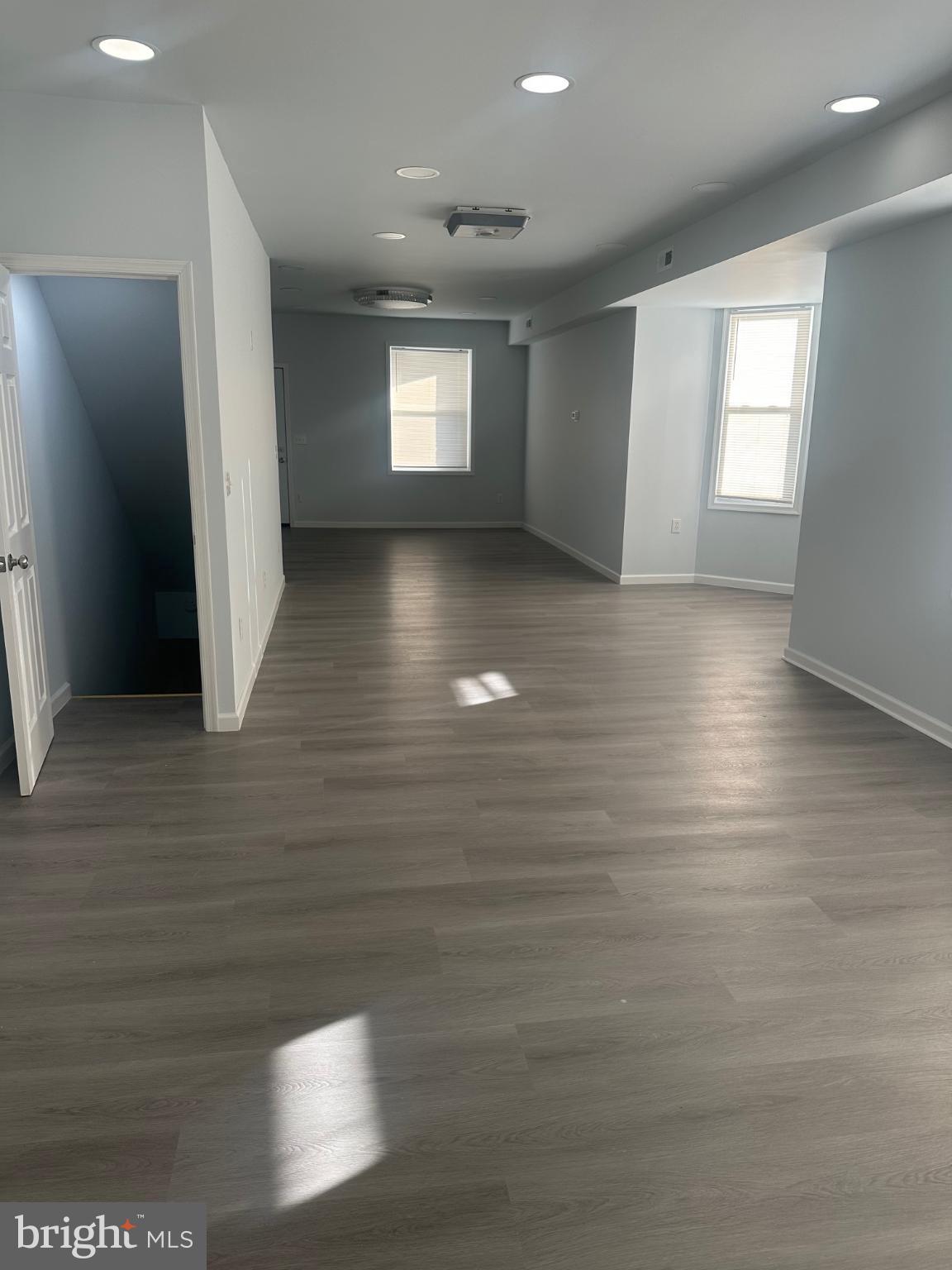 5100 Cottage Street Philadelphia, PA 19124 - Photo 11 of 20 a view of hallway with window and wooden floor