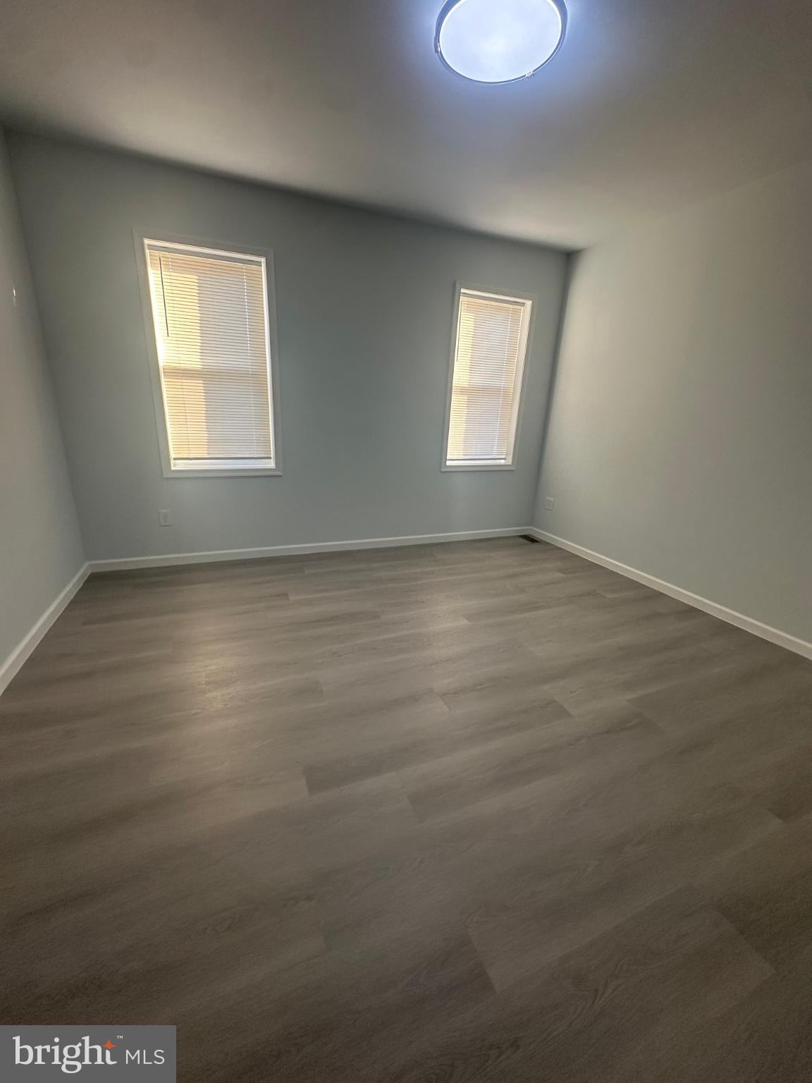 5100 Cottage Street Philadelphia, PA 19124 - Photo 16 of 20 wooden floor in an empty room with a window