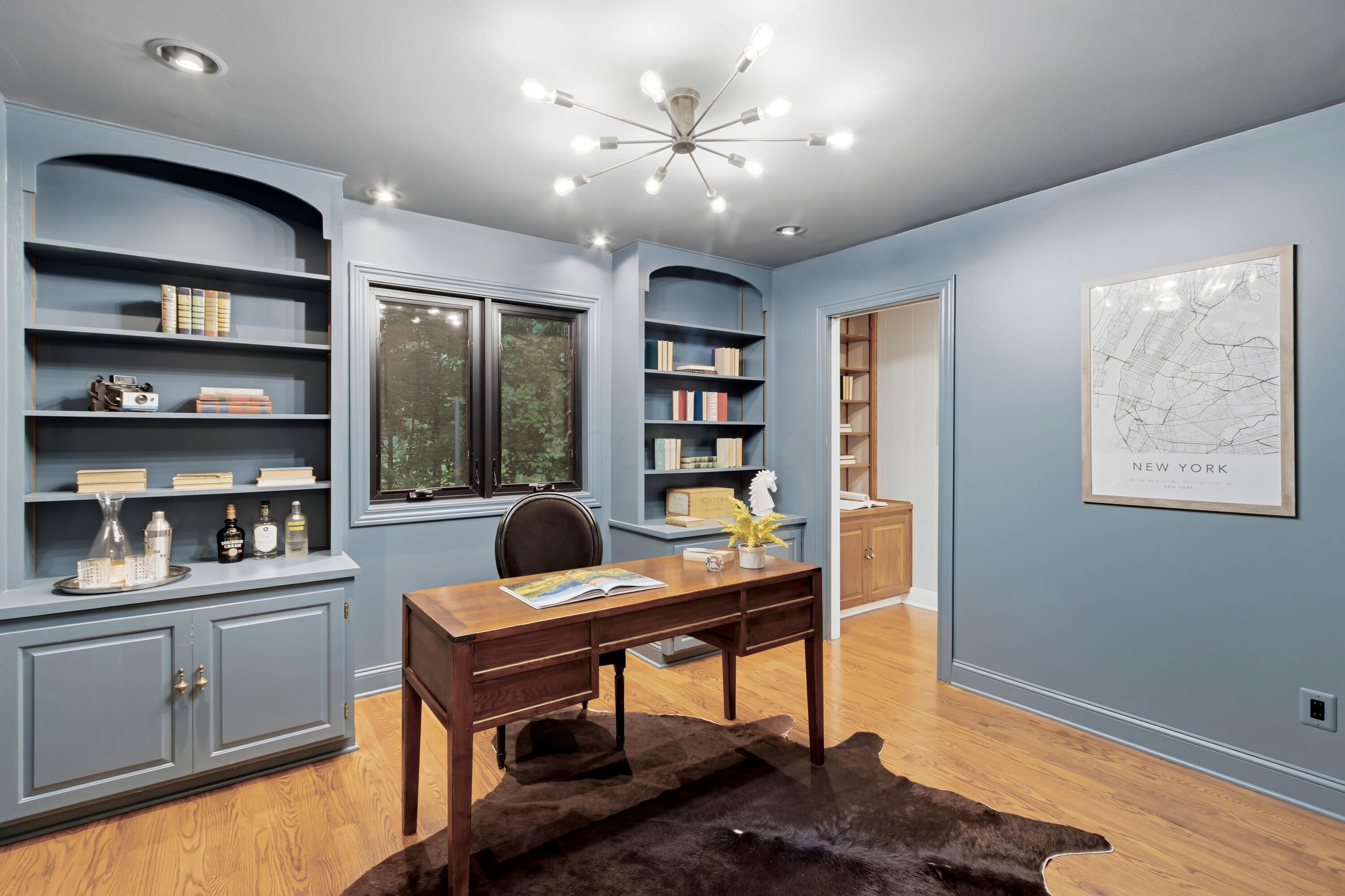 1560 Carriage Road Powell, OH 43065 - Photo 29 of 73 From the family room, step into the 1st floor office space featuring built-in cabinetry