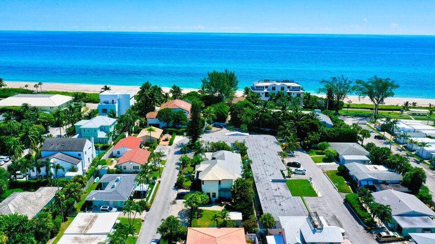 21 Oceanview Drive, Unit C Ocean Ridge, FL 33435 - Photo 3 of 17 a picture of houses with outdoor space