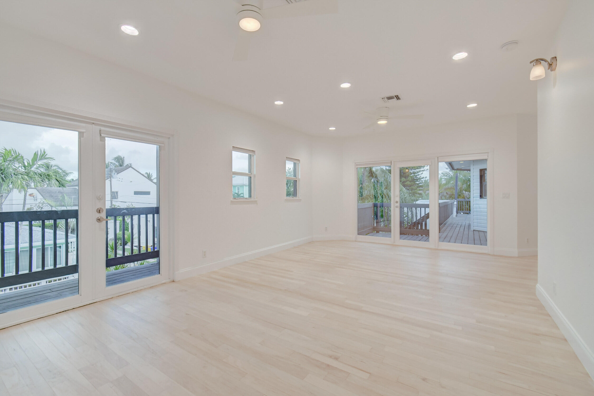 21 Oceanview Drive, Unit C Ocean Ridge, FL 33435 - Photo 10 of 17 a view of an empty room with a window