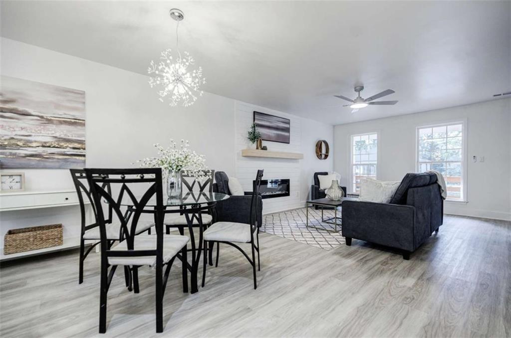 2223 Wingate Street Southwest Atlanta, GA 30310 - Photo 11 of 44 a view of a dining room with furniture and wooden floor