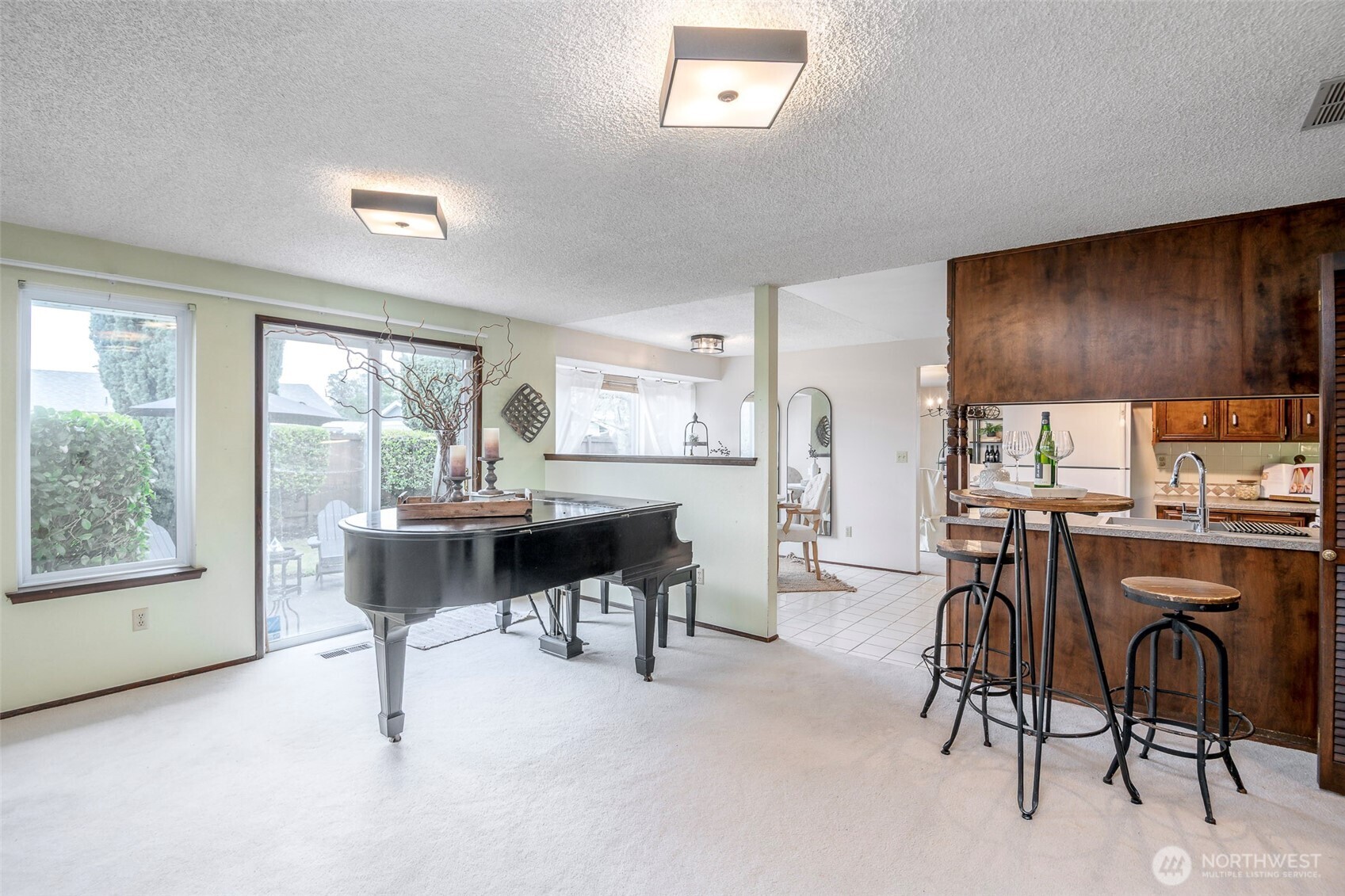61 Bonney Street Steilacoom, WA 98388 - Photo 11 of 34 a dining room with furniture and a window