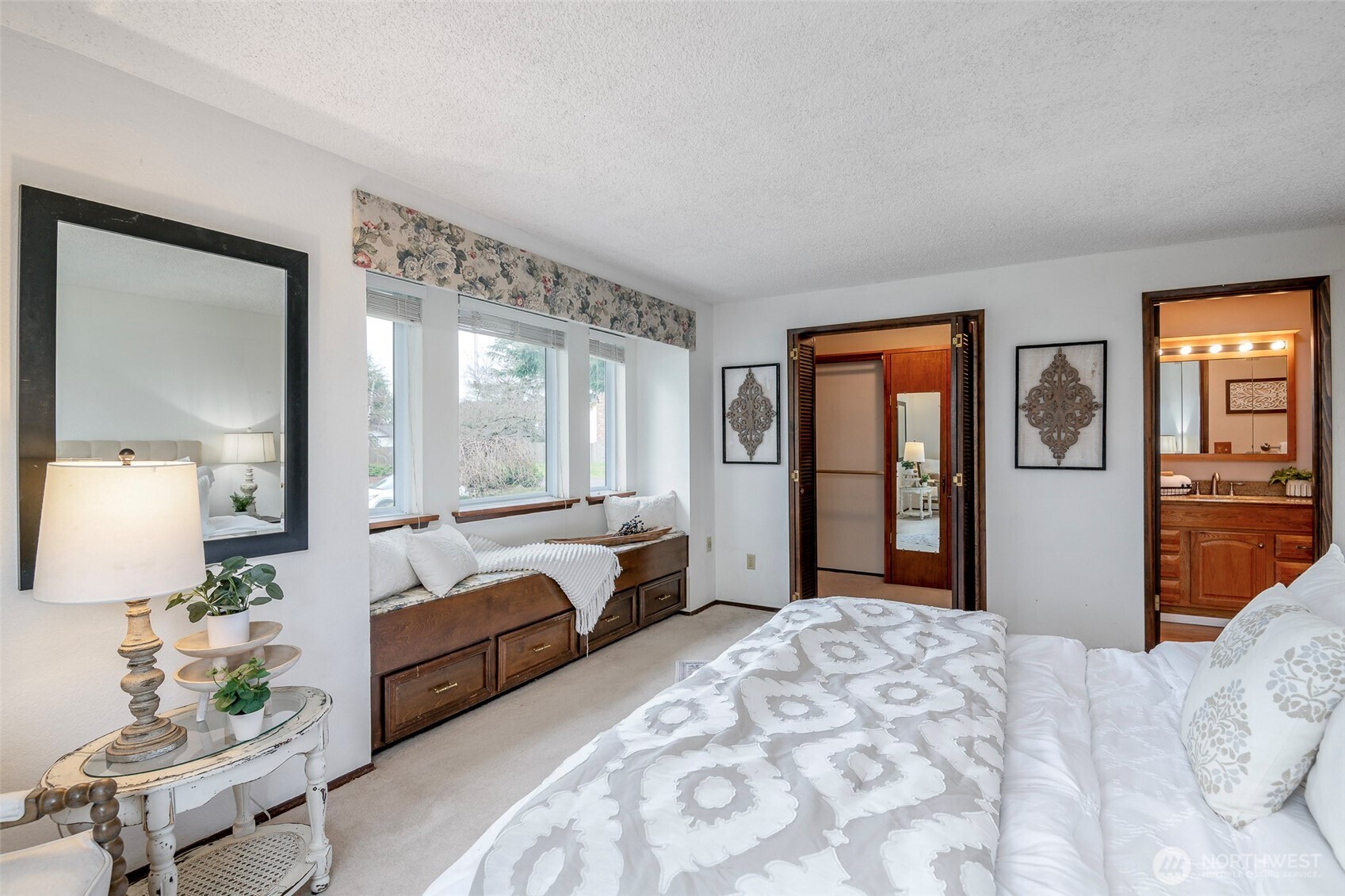 61 Bonney Street Steilacoom, WA 98388 - Photo 19 of 34 a bedroom with furniture and large windows